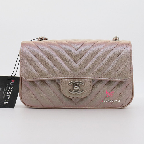 VAN CLEEF 
ARPELS Chanel Classic Mini Rectangular 17B Iridescent Rose Gold Chevron Caviar with silver hardware 