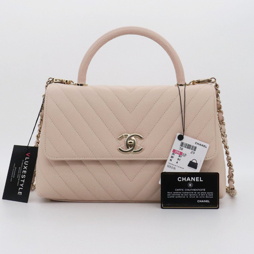 VAN CLEEF 
ARPELS Chanel Coco Handle 20A Beige/Pink Chevron Caviar with shiny light gold hardware 