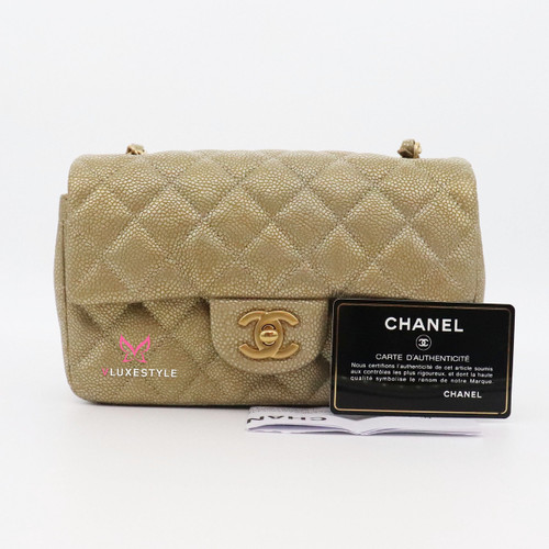 VAN CLEEF 
ARPELS Chanel Classic Mini Rectangular 15C Pearly Gold Quilted Caviar with brushed gold hardware 