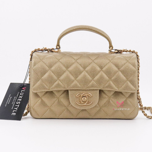 VAN CLEEF 
ARPELS Chanel Mini Rectangular with top handle 21S Gold Quilted Caviar with brushed gold hardware 