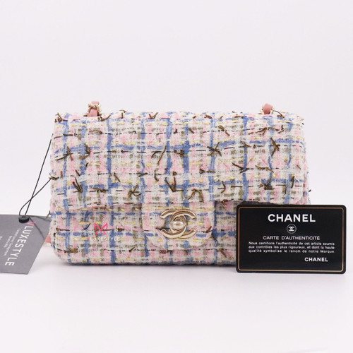 VAN CLEEF 
ARPELS Chanel Classic Mini Rectangular Pink, White, Blue, Gold Tweed with light gold hardware 