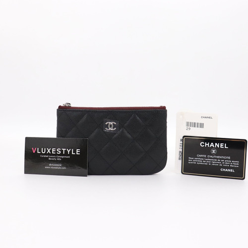 VAN CLEEF 
ARPELS Chanel Mini O Pouch Black Quilted Caviar with silver hardware 