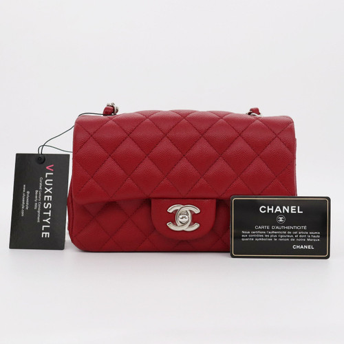 VAN CLEEF 
ARPELS Chanel Classic Mini Rectangular 17B Red Quilted Caviar with silver hardware 