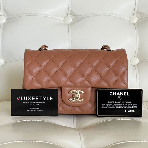 VAN CLEEF 
ARPELS Chanel Classic Mini Rectangular 21P Dark Brown Caramel Quilted Lambskin with light gold hardware 