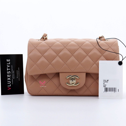 VAN CLEEF 
ARPELS Chanel Classic Mini Rectangular 21A Beige Quilted Lambskin with light gold hardware 