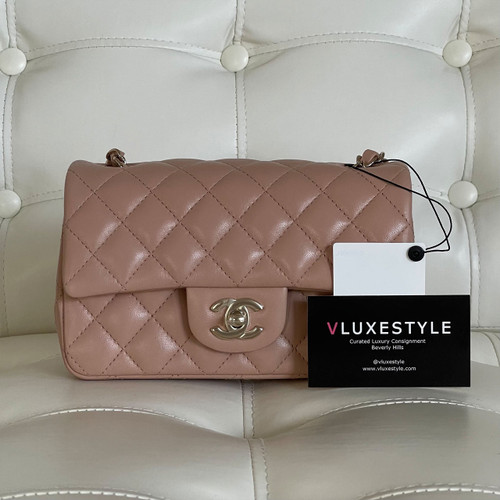 VAN CLEEF 
ARPELS Chanel Classic Mini Rectangular 21A Beige Quilted Lambskin with light gold hardware 