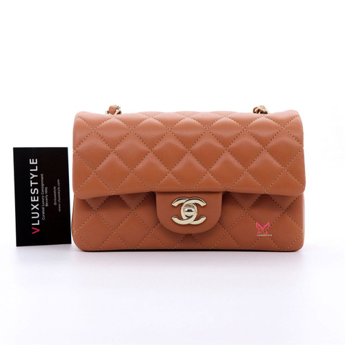 VAN CLEEF 
ARPELS Chanel Classic Mini Rectangular 21P Dark Brown/Caramel Quilted Lambskin with light gold hardware 