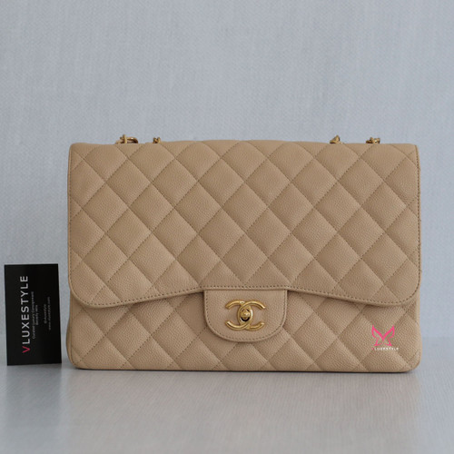 VAN CLEEF 
ARPELS Chanel Classic Jumbo Single Flap Beige Quilted Caviar with gold hardware 