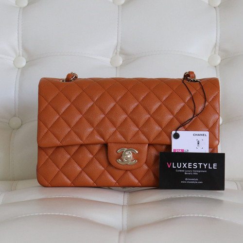 VAN CLEEF 
ARPELS Chanel Classic Medium Double Flap 21A Light Brown/Caramel Quilted Caviar with light gold hardware. 