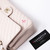 VAN CLEEF 
ARPELS Chanel Classic Medium Double Flap 20B Ivory/Beige Chevron Caviar with light gold hardware 
