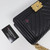 VAN CLEEF 
ARPELS Chanel Le Boy Old Medium 21B Black Chevron Caviar with brushed gold hardware 