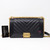 VAN CLEEF & ARPELS Chanel Le Boy Old Medium 21B Black Chevron Caviar with brushed gold hardware 