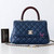 CHANEL Chanel Mini/Small Coco Handle 22P Navy Quilted Caviar with Lizard Embossed Top Handle Light gold hardware 