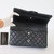 CHANEL Chanel Classic  Medium Double Flap 18C Black Quilted Caviar with gun metal hardware 