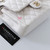 CHANEL Chanel Classic Small Flap 19B White Quilted Caviar with light gold hardware 