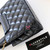 CHANEL Chanel 23K Nano Kelly Shopping Bag Black Shiny Aged Quilted Calfskin Brushed Gold Hardware 
