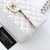 CHANEL Chanel Classic Medium Flap 19B White Quilted Caviar Light Gold Hardware 