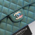 CHANEL Chanel Classic Medium Flap 22P Iridescent Green Quilted Caviar with light gold hardware 