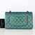 CHANEL Chanel Classic Medium Flap 22P Iridescent Green Quilted Caviar with light gold hardware 