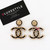 CHANEL Chanel 21K CC Drop Earrings Black Lambskin Crystals Pearly White 
