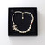 CHANEL Chanel 23V Pearl CC 100th Anniversary Short  Necklace Light Gold 
