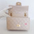 CHANEL Mini Reissue 2.55 Flap 23P Ecru Aged Quilted Brushed Gold Hardware 