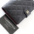 CHANEL Passport Holder 25S Black Quilted Caviar Light Gold Hardware 
