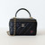 CHANEL Vanity Case Top Handle with Chain Black Quilted Lambskin Light Gold Hardware 