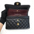 VAN CLEEF 
ARPELS Chanel Classic Small Double Flap Black Quilted Caviar with gold hardware 