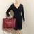 VAN CLEEF 
ARPELS Chanel 18K Studded Burgundy Caviar Leather Deauville 