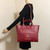 VAN CLEEF 
ARPELS Chanel 18K Studded Burgundy Caviar Leather Deauville 