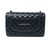 VAN CLEEF 
ARPELS Chanel Classic Black Jumbo Double Flap Caviar with silver hardware 