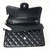 VAN CLEEF 
ARPELS Chanel Classic Black Jumbo Double Flap Caviar with silver hardware 