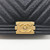 VAN CLEEF 
ARPELS Chanel 18K Le Boy Old Medium Black Chevron Caviar with brushed gold hardware 