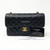 VAN CLEEF 
ARPELS Chanel Classic Black Small Caviar Double Flap with gold hardware 