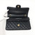 VAN CLEEF 
ARPELS Chanel Classic Black Quilted Caviar Medium Double Flap with gold hardware 