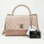VAN CLEEF 
ARPELS Chanel 19P Small Coco Handle Beige Quilted Caviar with shiny gold hardware 