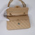 VAN CLEEF 
ARPELS Chanel Classic Small Double Flap Beige Quilted Caviar with gold hardware 