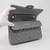VAN CLEEF 
ARPELS Chanel Classic Medium 17B Gray Quilted Caviar with silver hardware 
