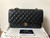 Classic Medium Black Quilted Caviar with gold hardware