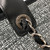 VAN CLEEF & ARPELS Chanel Deauville with Handle 18C Black/Gray Tweed with silver hardware 