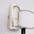 VAN CLEEF 
ARPELS Chanel Coco Handle 20K Iridescent White Quilted Caviar with shiny light gold hardware 