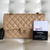 VAN CLEEF 
ARPELS Chanel Classic Medium Double Flap 19C Beige Quilted Caviar with light gold hardware 