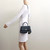 VAN CLEEF 
ARPELS Chanel Mini Coco Handle 21P Navy Quilted Caviar with lizard embossed handle and light gold hardware 