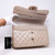 VAN CLEEF & ARPELS Chanel Classic Jumbo Double Flap 12P Pearly Beige Quilted Caviar with Matte Gold hardware 