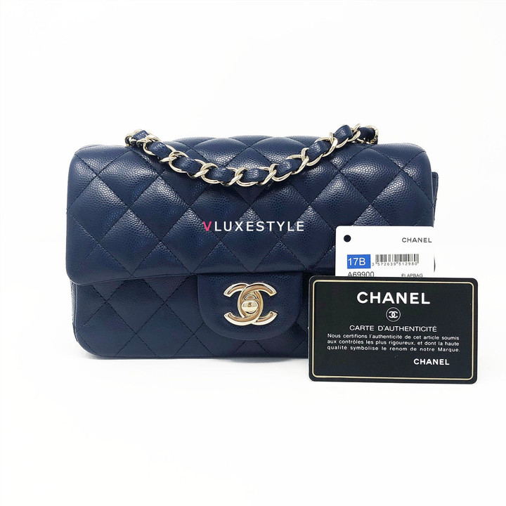 VAN CLEEF 
ARPELS Chanel 17B Mini Rectangular Navy Caviar with light gold hardware 