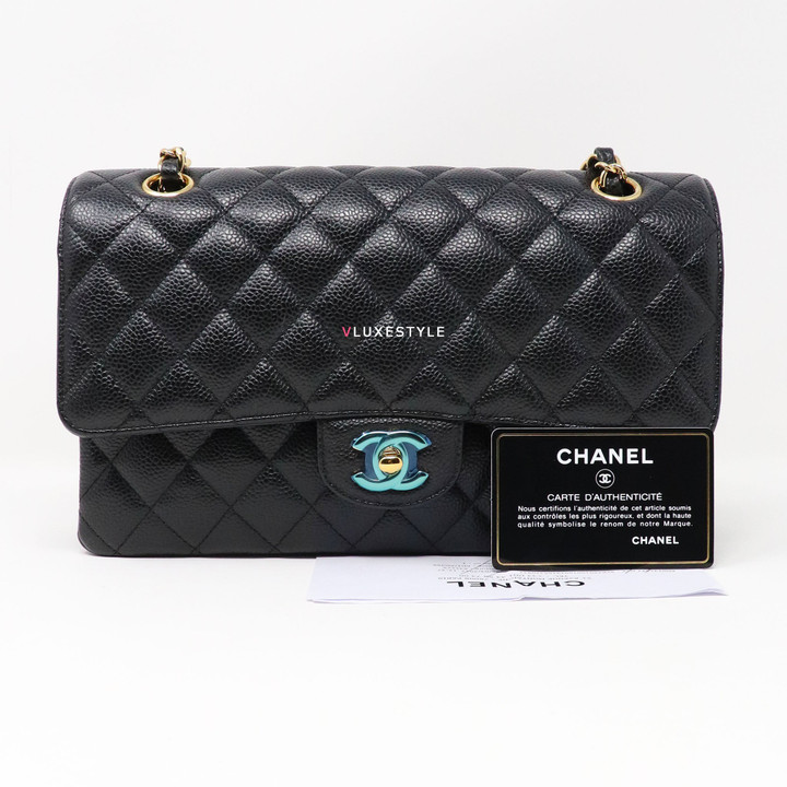 Chanel Classic Medium Double Flap Black Quilted Caviar with gold hardware.