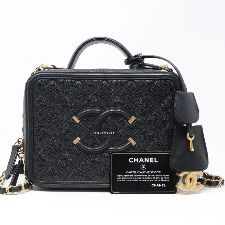 VAN CLEEF 
ARPELS Remaining Balance: Chanel Vanity Case Medium Black Quilted with brushed gold hardware 