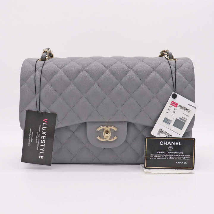 VAN CLEEF 
ARPELS Chanel Classic Jumbo Double Flap 20C Gray Quilted Caviar with light gold hardware 