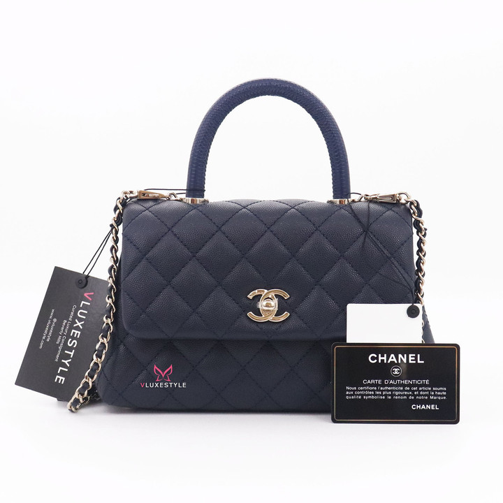 VAN CLEEF 
ARPELS Chanel Mini Coco Handle 21P Navy Quilted Caviar with lizard embossed handle and light gold hardware 